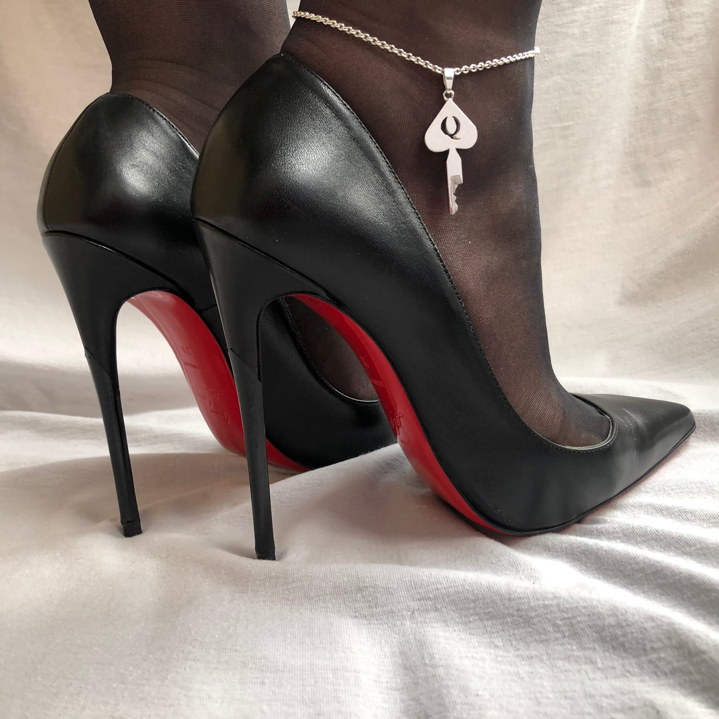 Queen of Spades chastity key