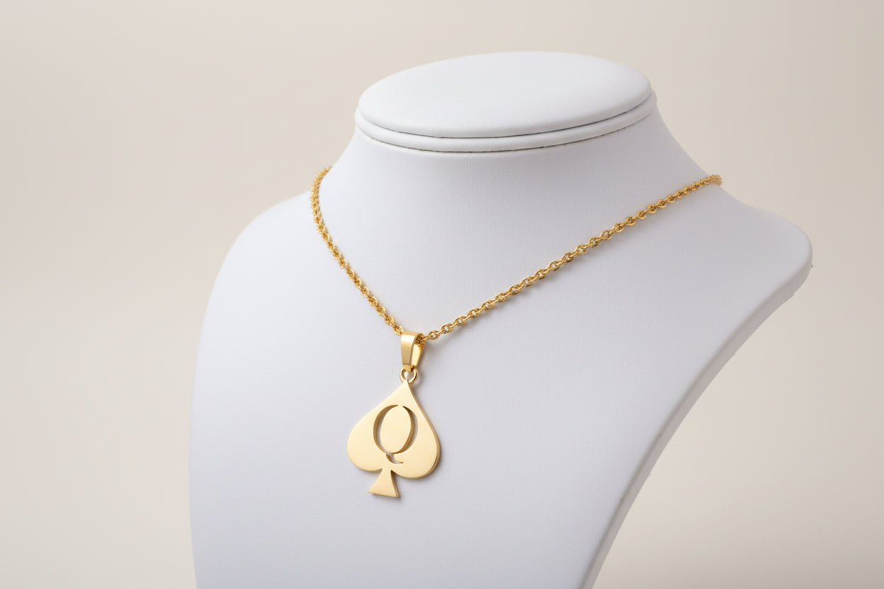 Queen of Spades in gold