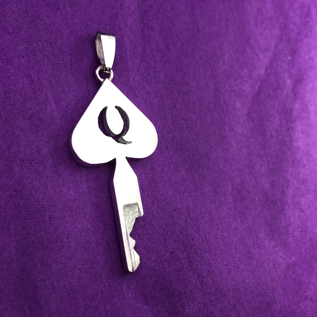 Queen of Spades chastity key