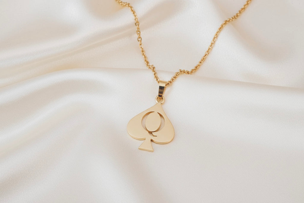 Queen of Spades in gold