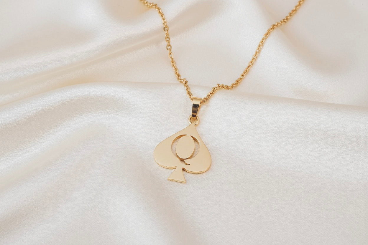 Queen of Spades in gold