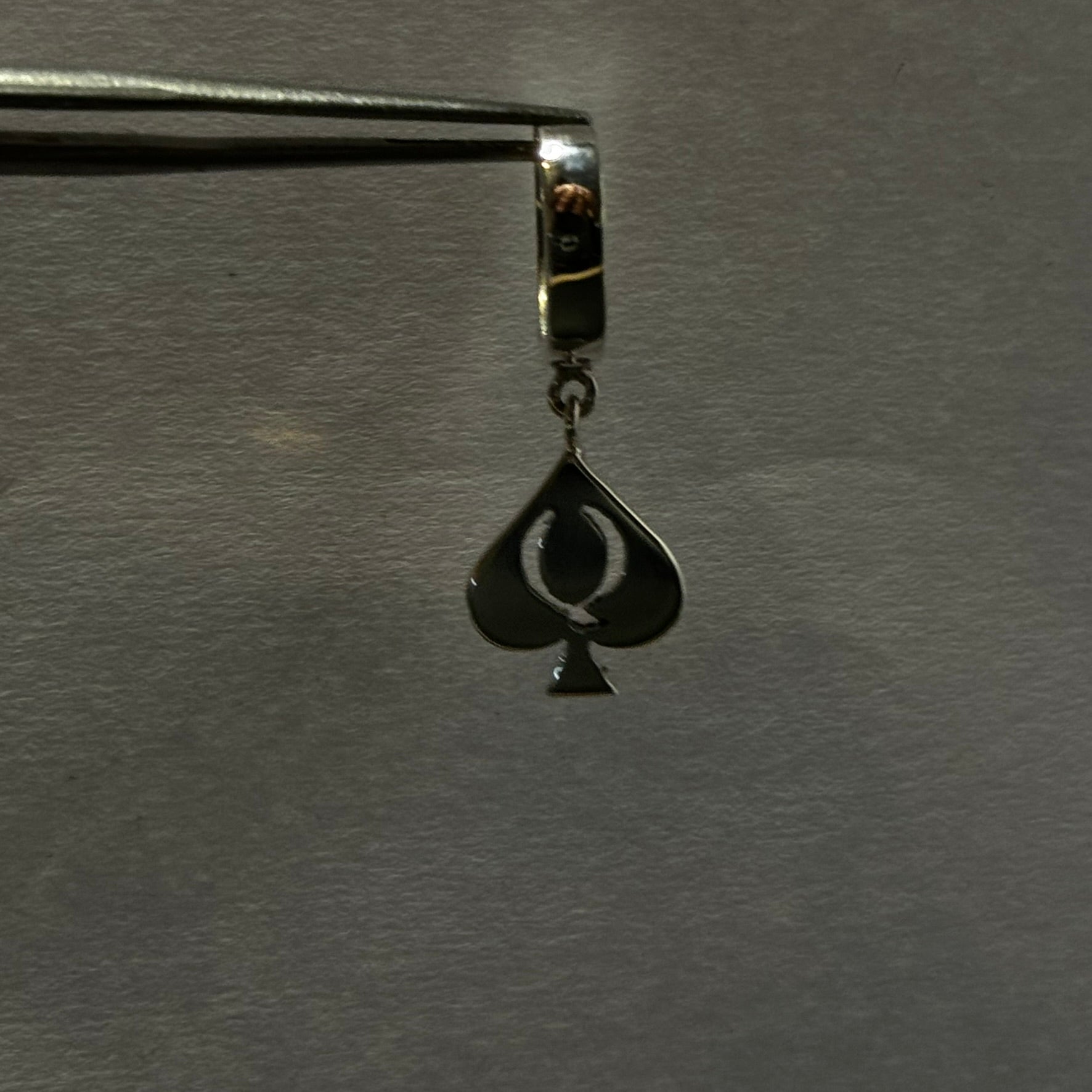 QoS earrings in silver